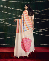 A multicolored cotton silk printed Bollywood saree with a traditional design, featuring stripes and floral patterns