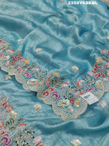 A blue saree with tissue silk fabric and Bollywood-style sequence embroidery work, including floral patterns and a border.