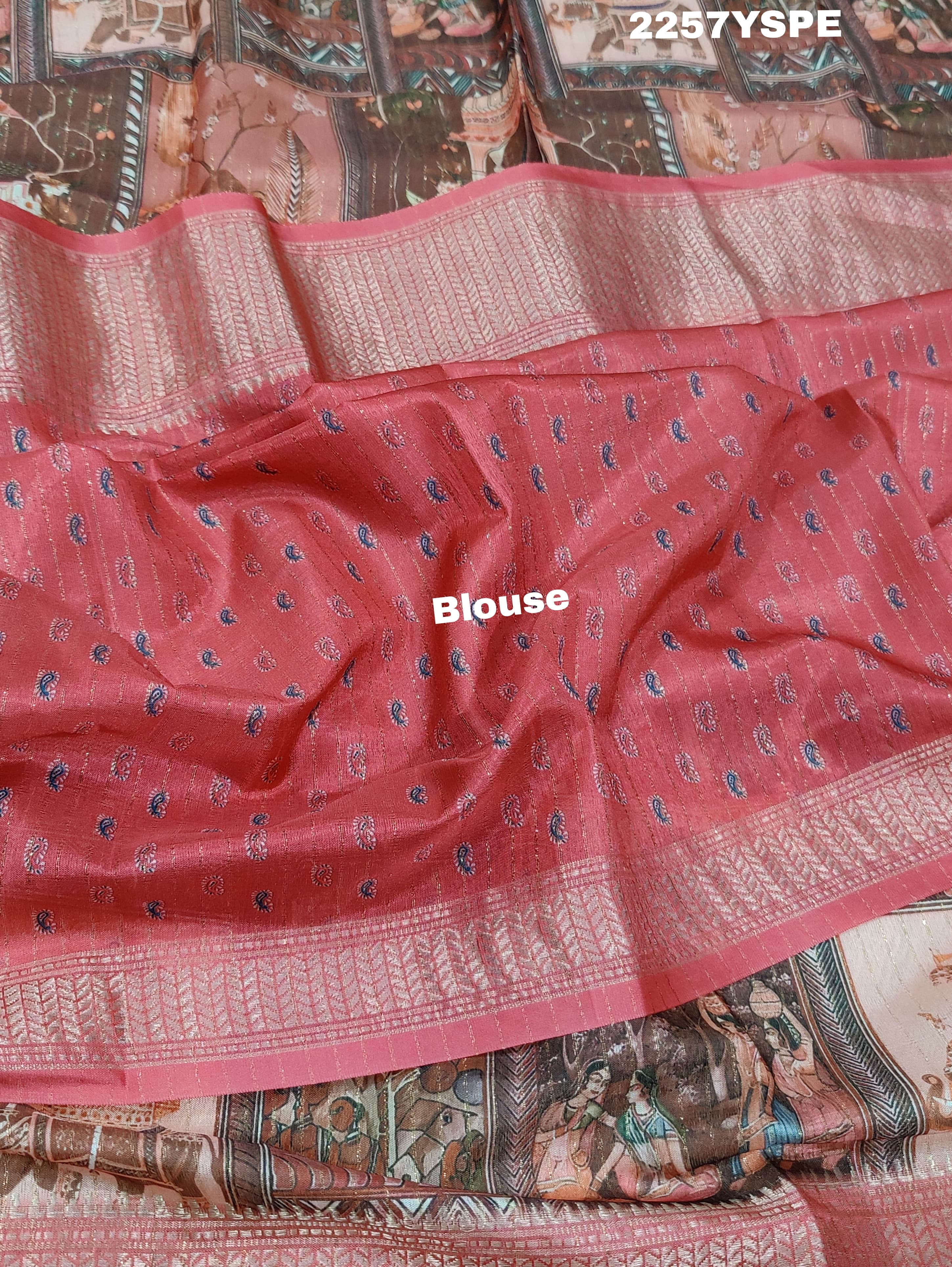 A saree with a kalamkari style pattern in pink colors, with zari weaving and a Banarasi border.