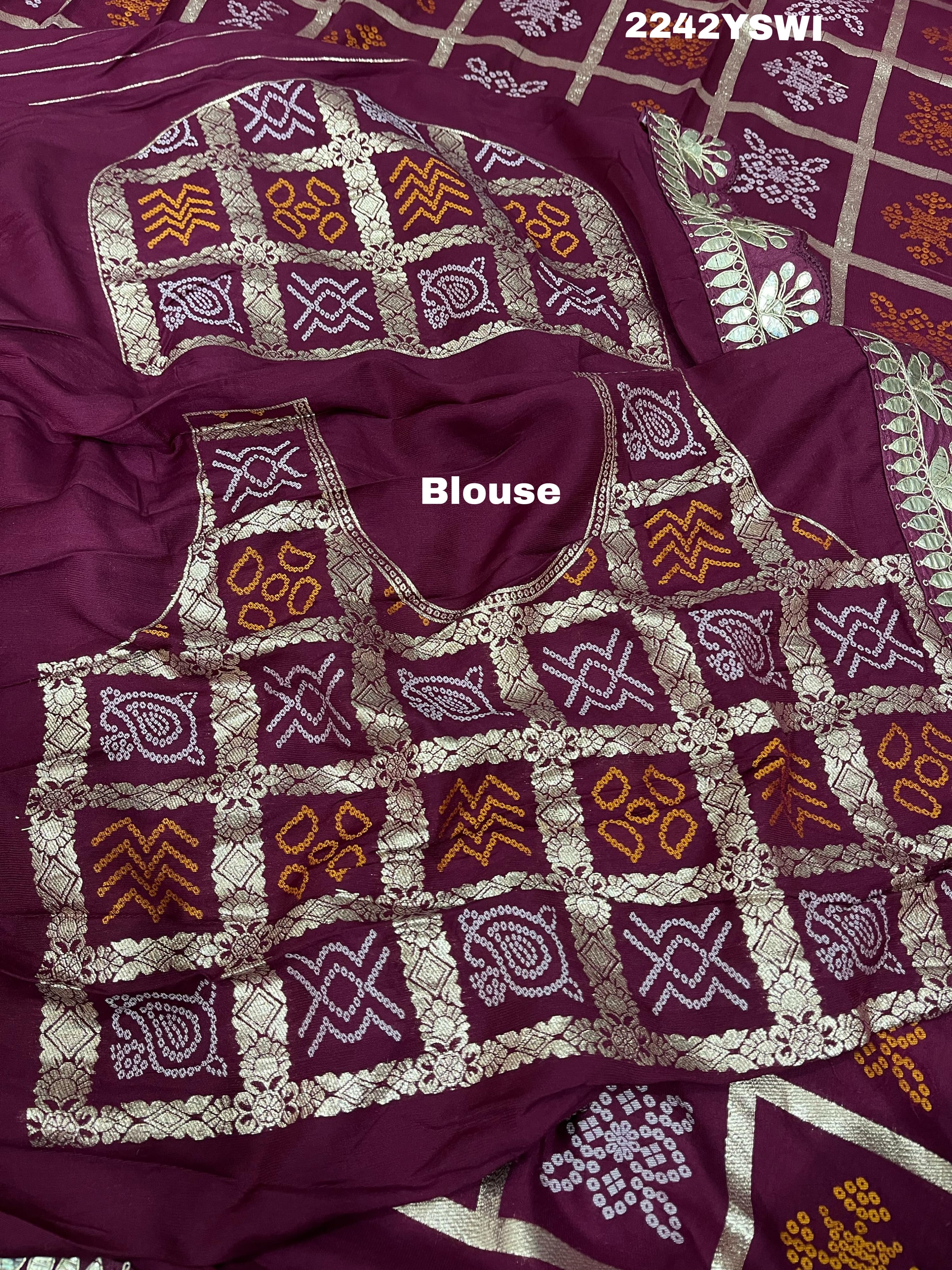 A wine saree with white patterns withCotton silk Bandhani Gotapatti Work Saree