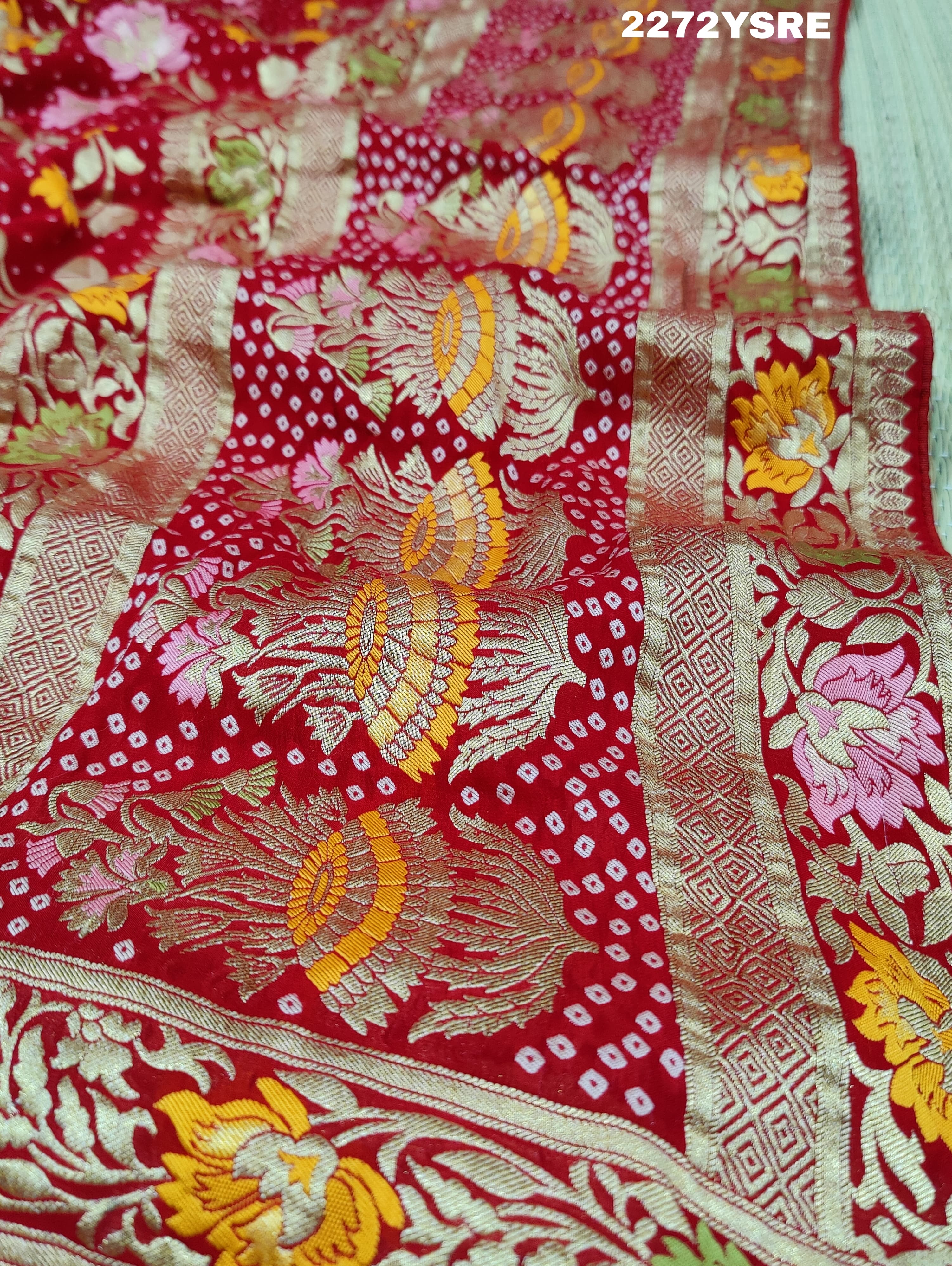 A red and gold Georgette saree with Meenakari weaving pattern