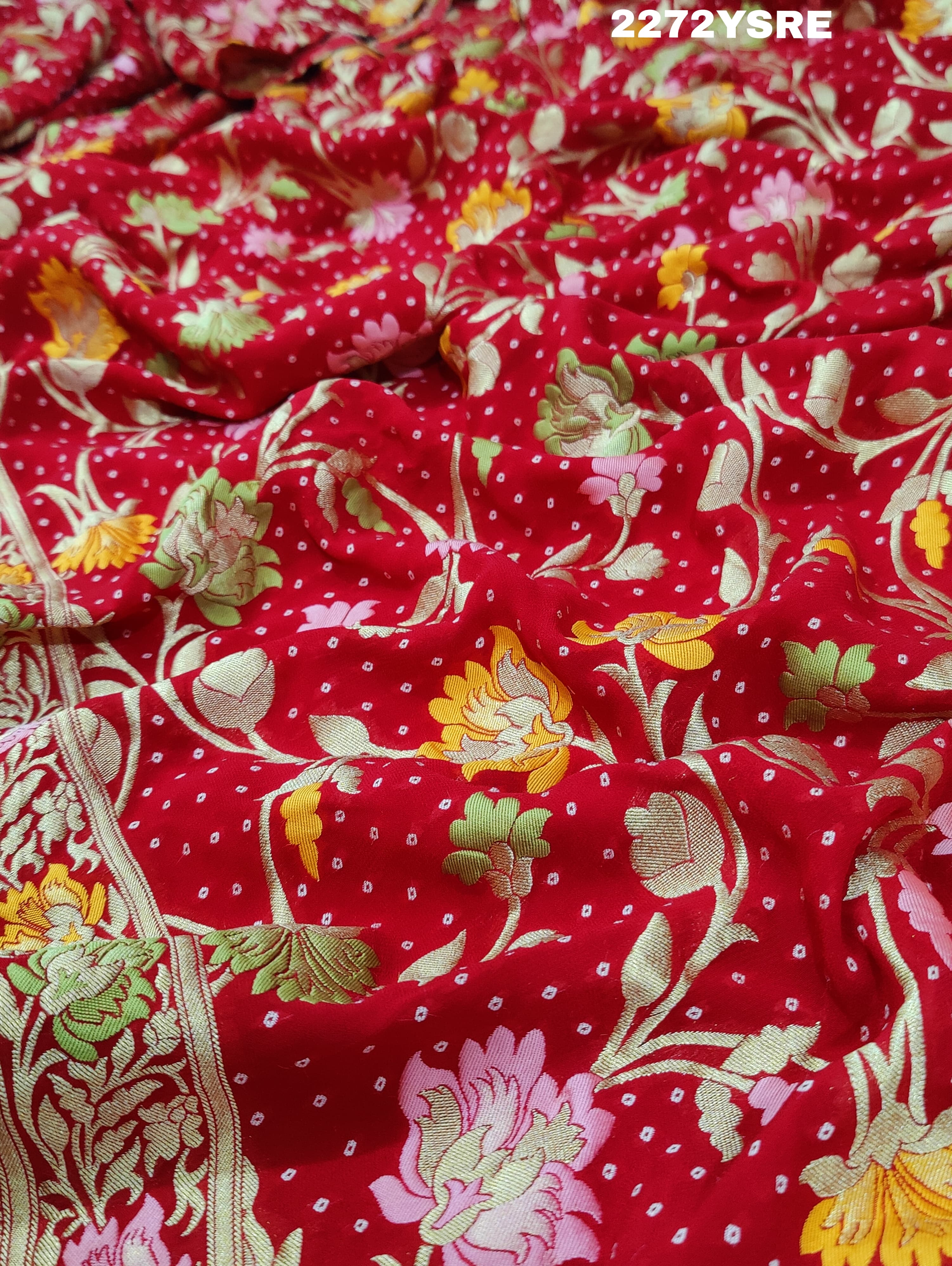 A red and gold Georgette saree with Meenakari weaving pattern