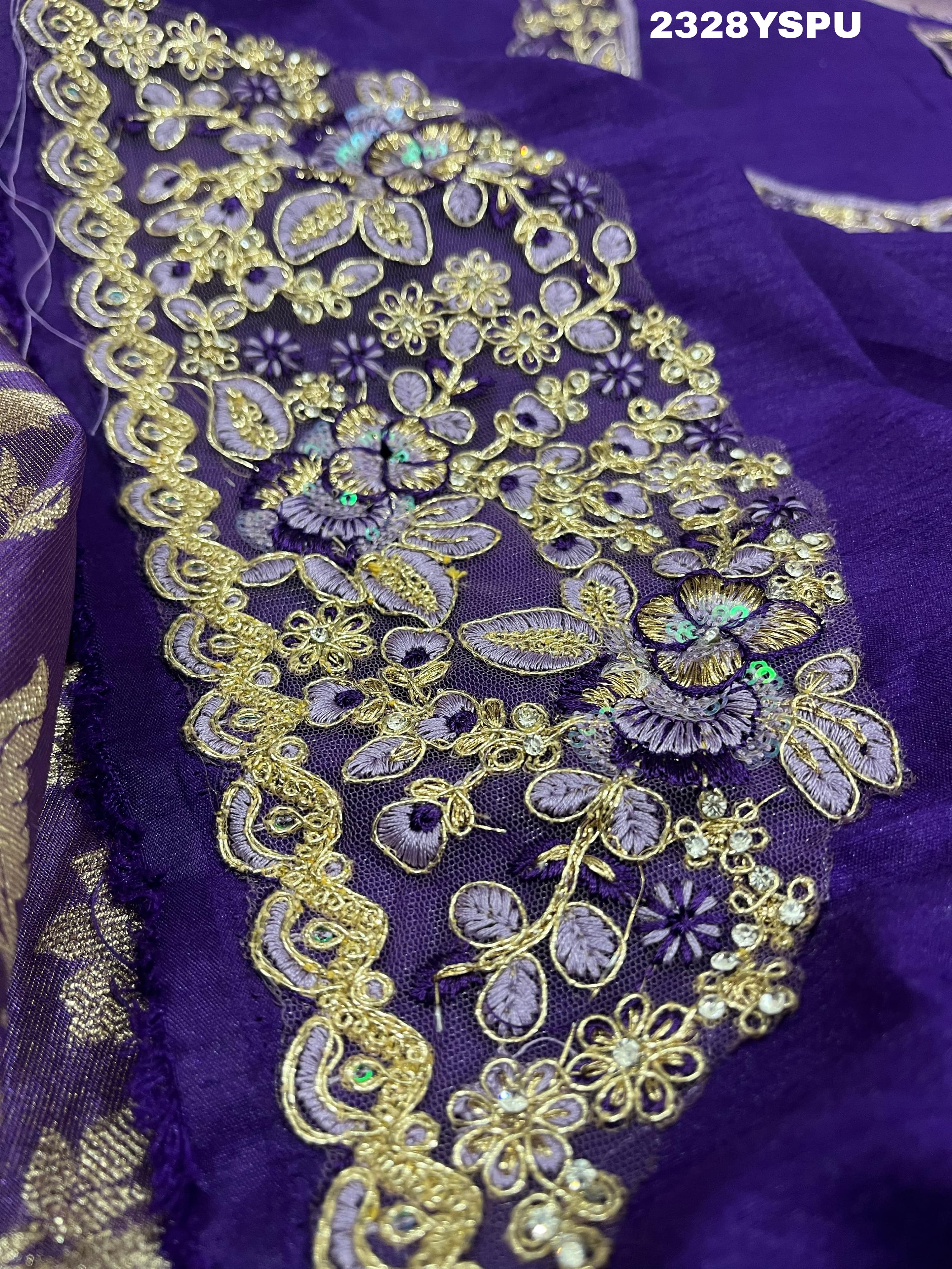 A purple Banarasi style saree with sequence embroidery work
