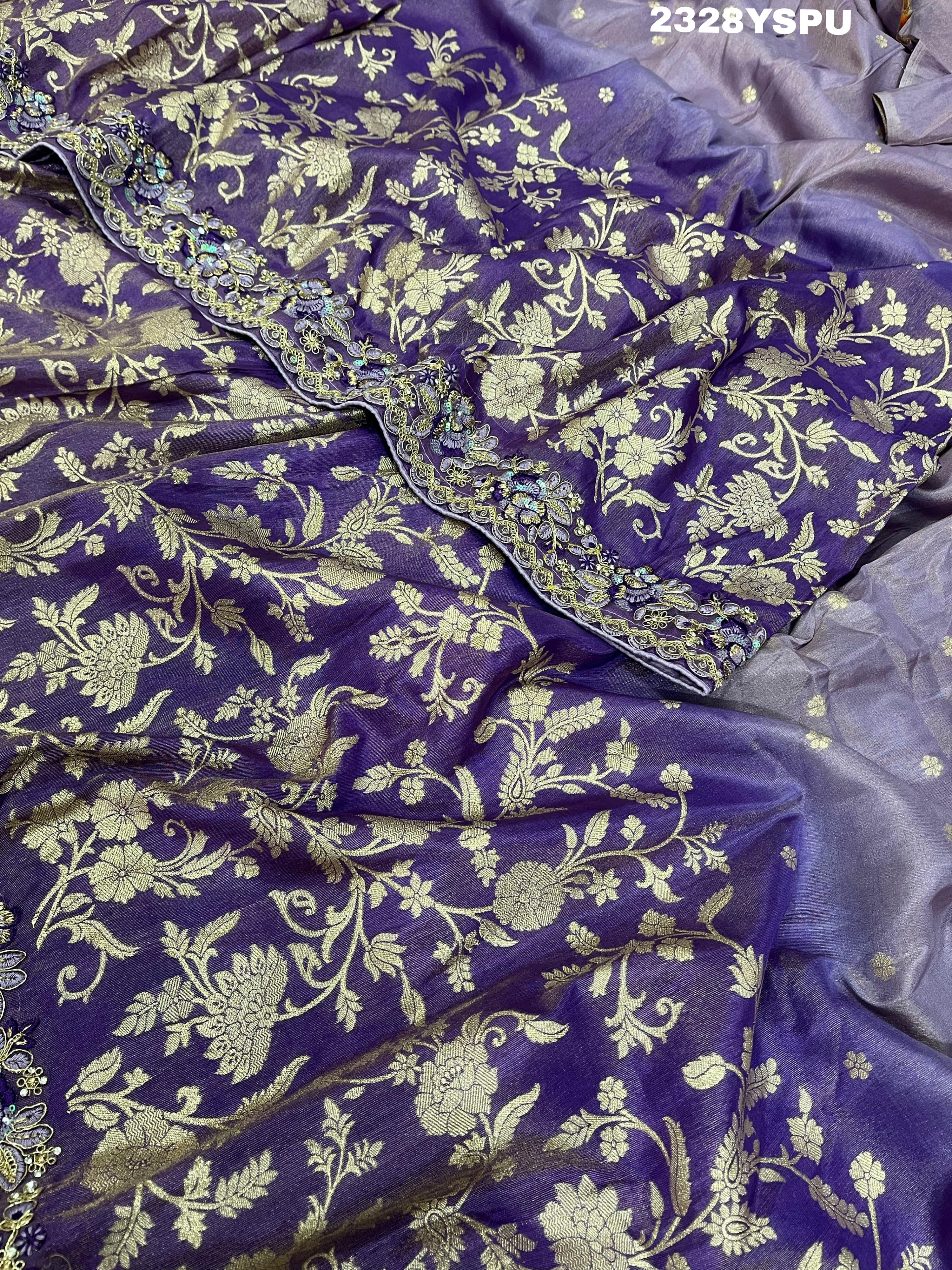 A purple Banarasi style saree with sequence embroidery work