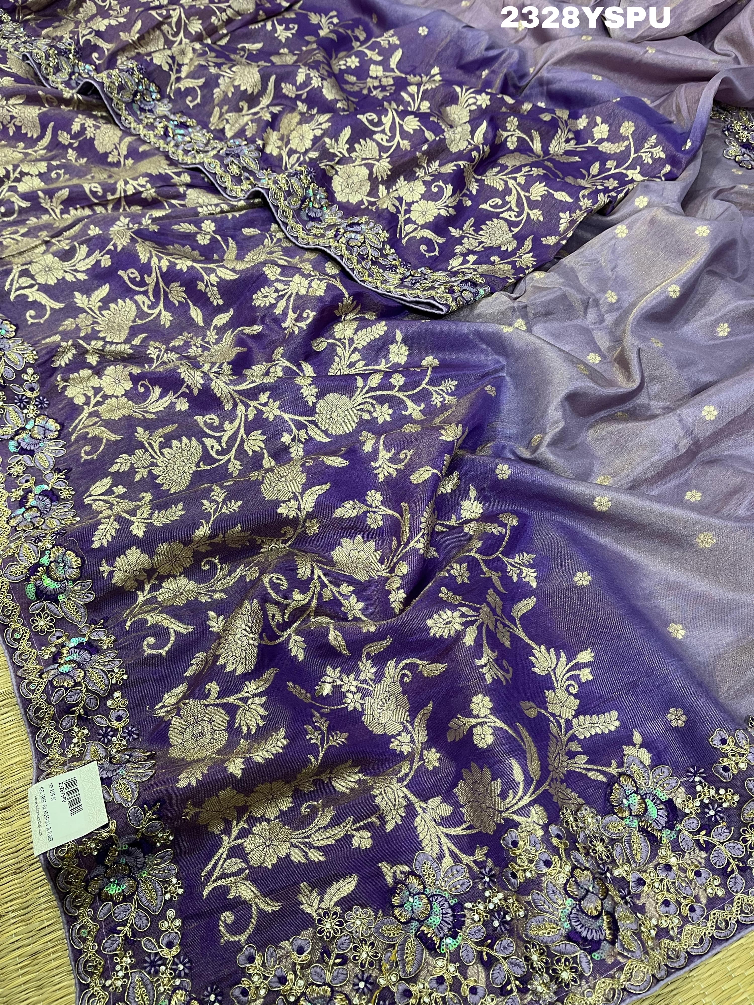 A purple Banarasi style saree with sequence embroidery work