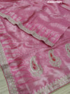 A pink Banarsi silk Bollywood style saree with sequence and gotapatti work