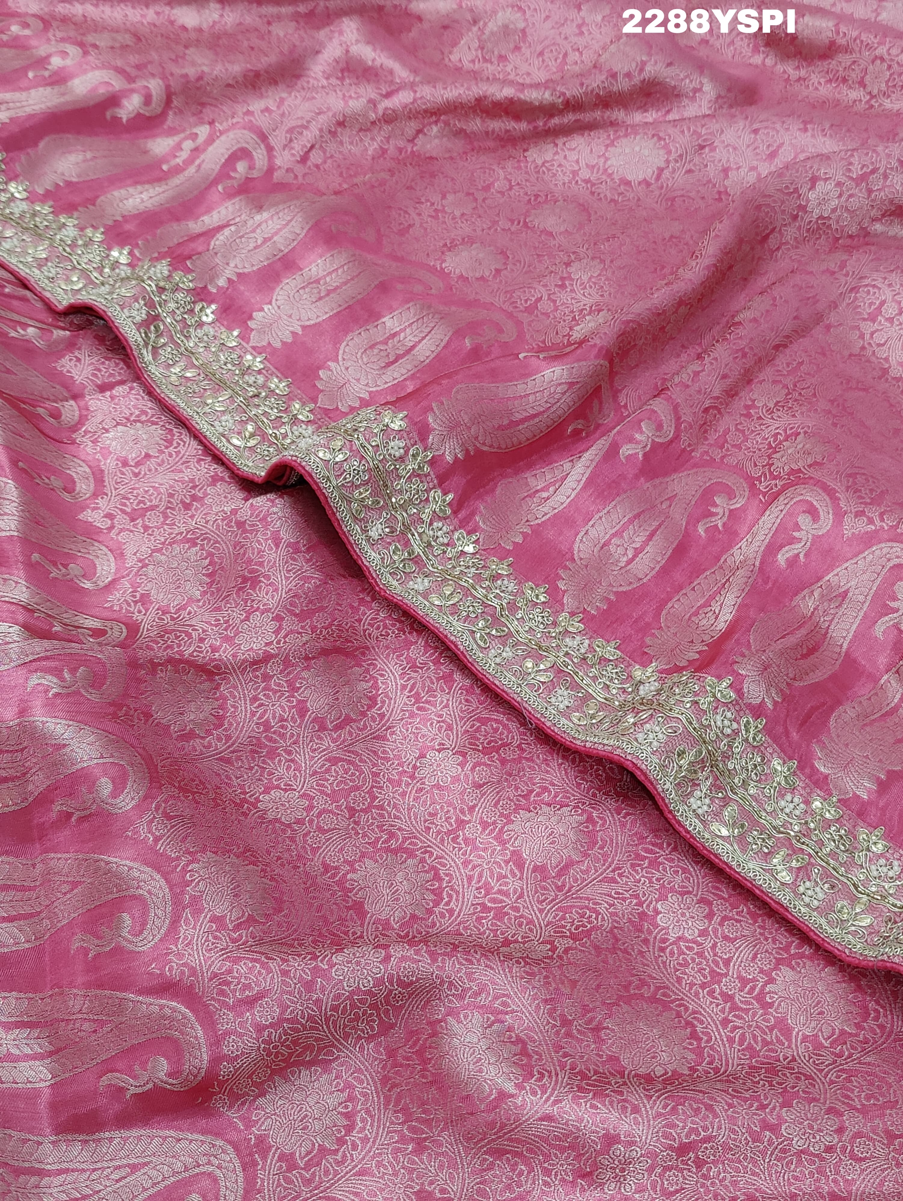 A pink Banarsi silk Bollywood style saree with sequence and gotapatti work