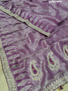 A purple Banarsi silk Bollywood style saree with sequence and gotapatti work, showing detailed patterns and embroidery.