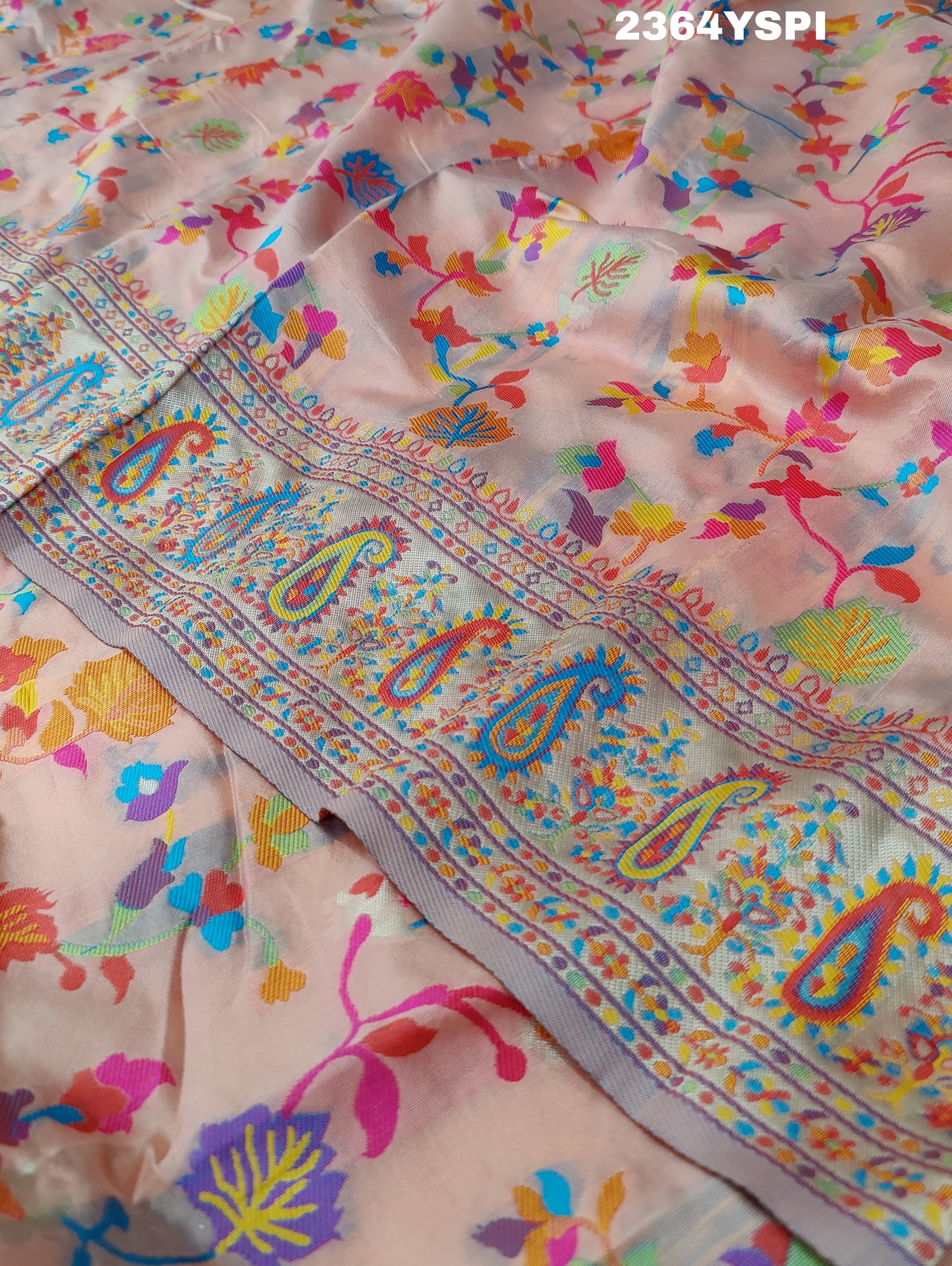 A pink and yellow cotton silk saree with Kashmiri style patterns and Meenakari weaving work.