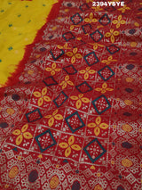A yellow and red Dola silk saree with Zari weaving and a floral pattern,