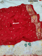 A Banarasi style saree with zari weaving, showcasing both the intricate detailing and the fabric's texture.