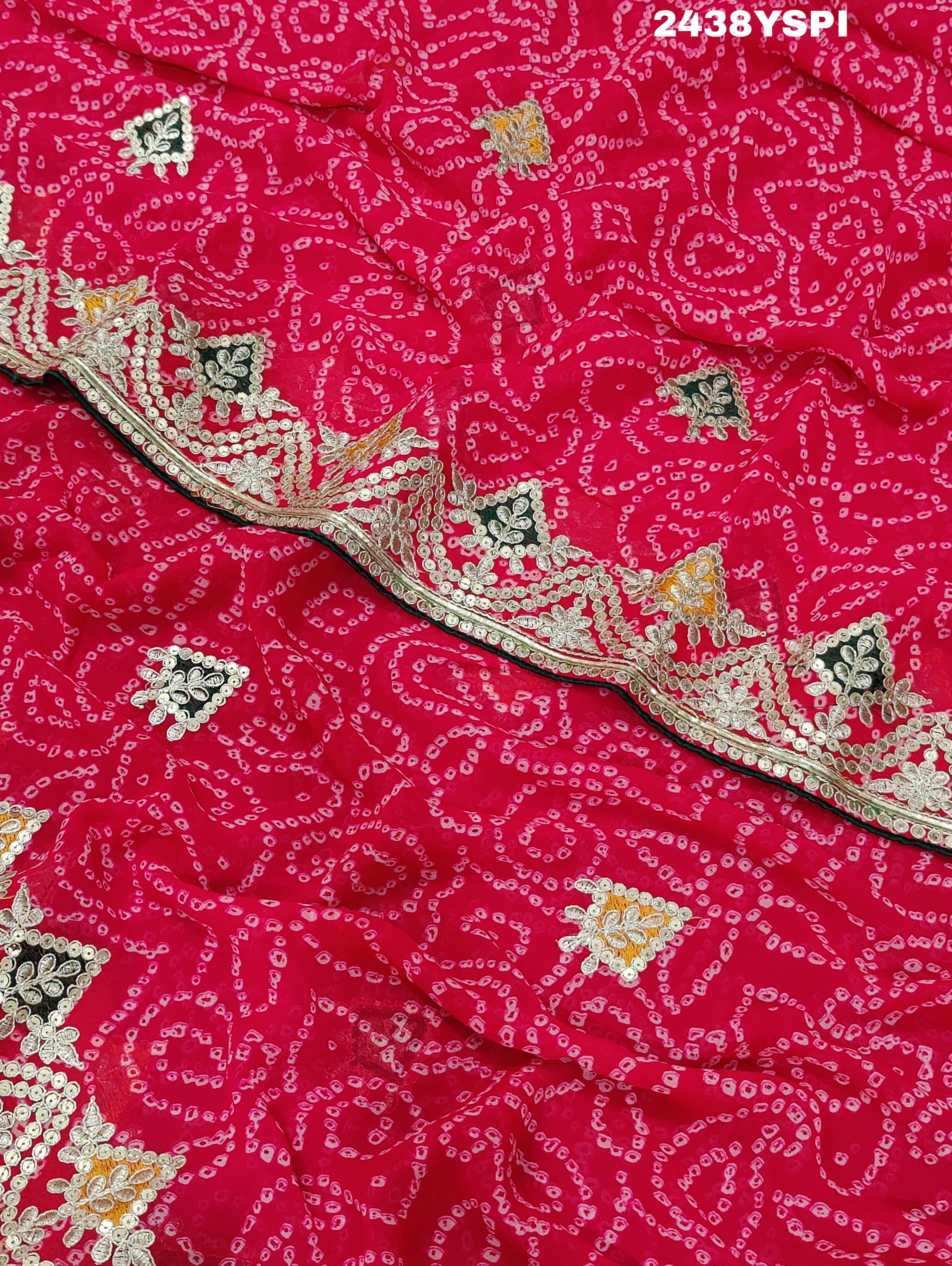 A pink chiffon saree with bandhani pattern and gotapatti work