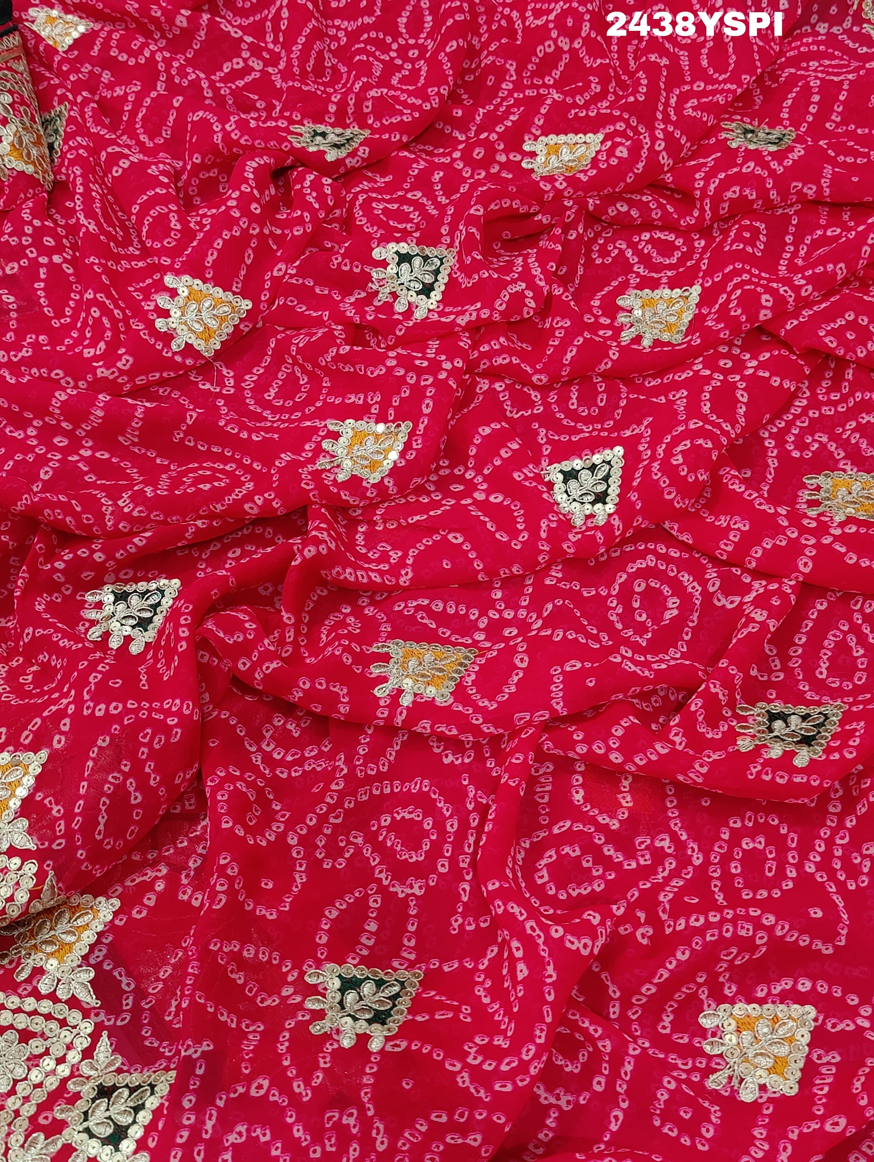 A pink chiffon saree with bandhani pattern and gotapatti work