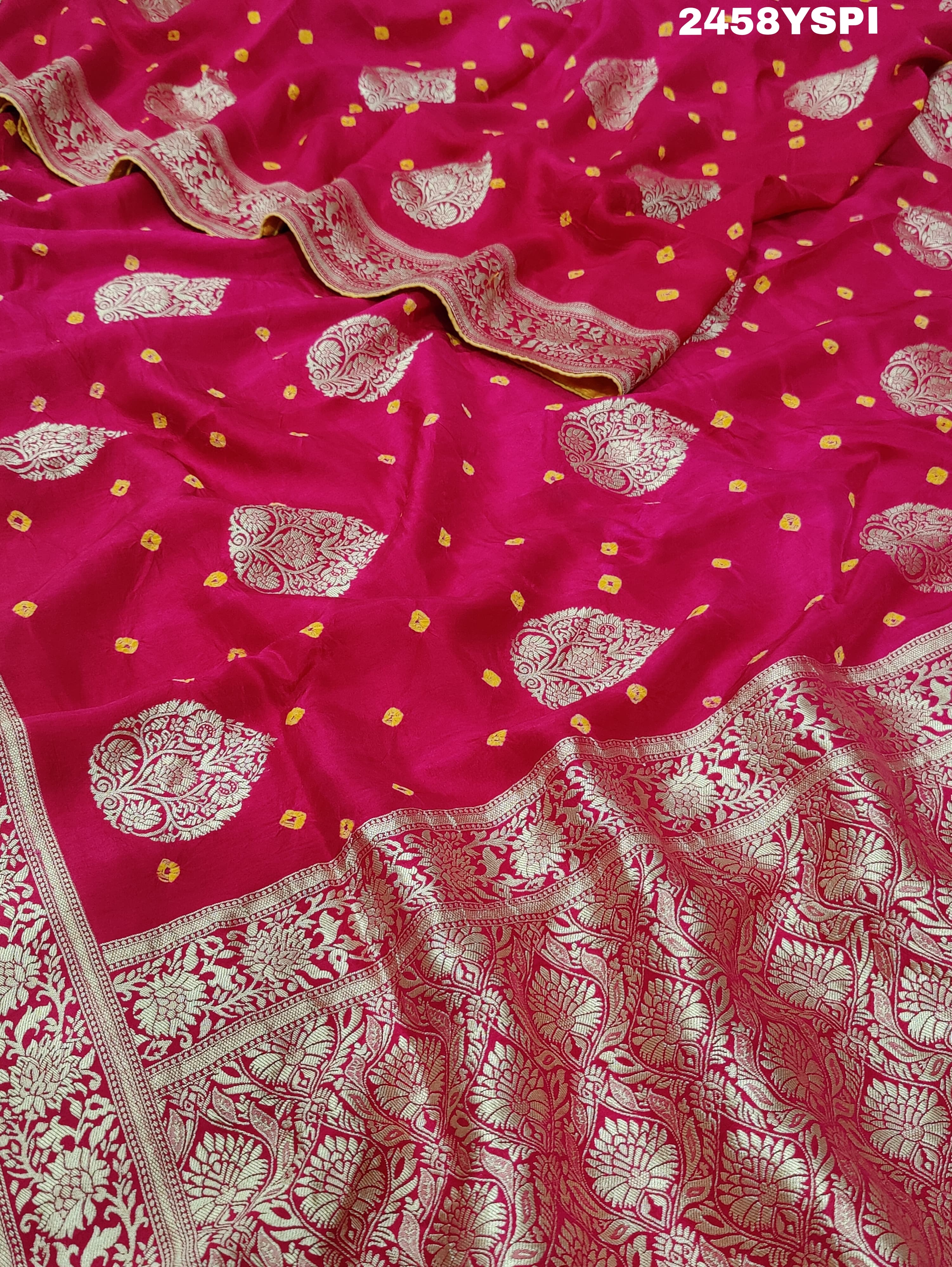 A pink Dola Silk Banarasi saree with Zari weaving work