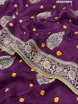 A purple Dola silk saree with detailed Zari weaving work and a Banarasi style pattern, including a wide border with similar ornate design.