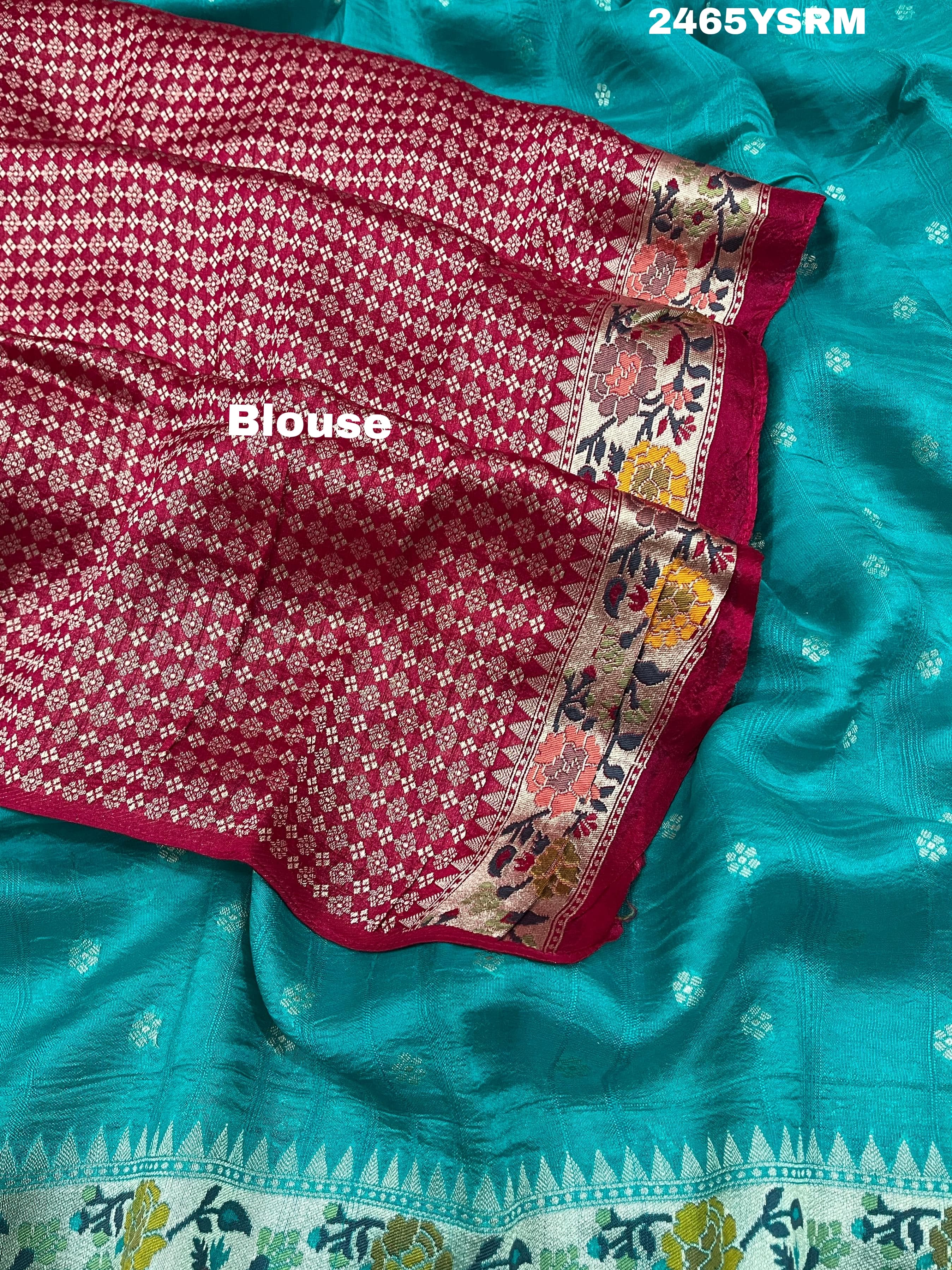 A teal saree with floral patternsBanarasi Silk Printed Style With zari weaving Work Saree