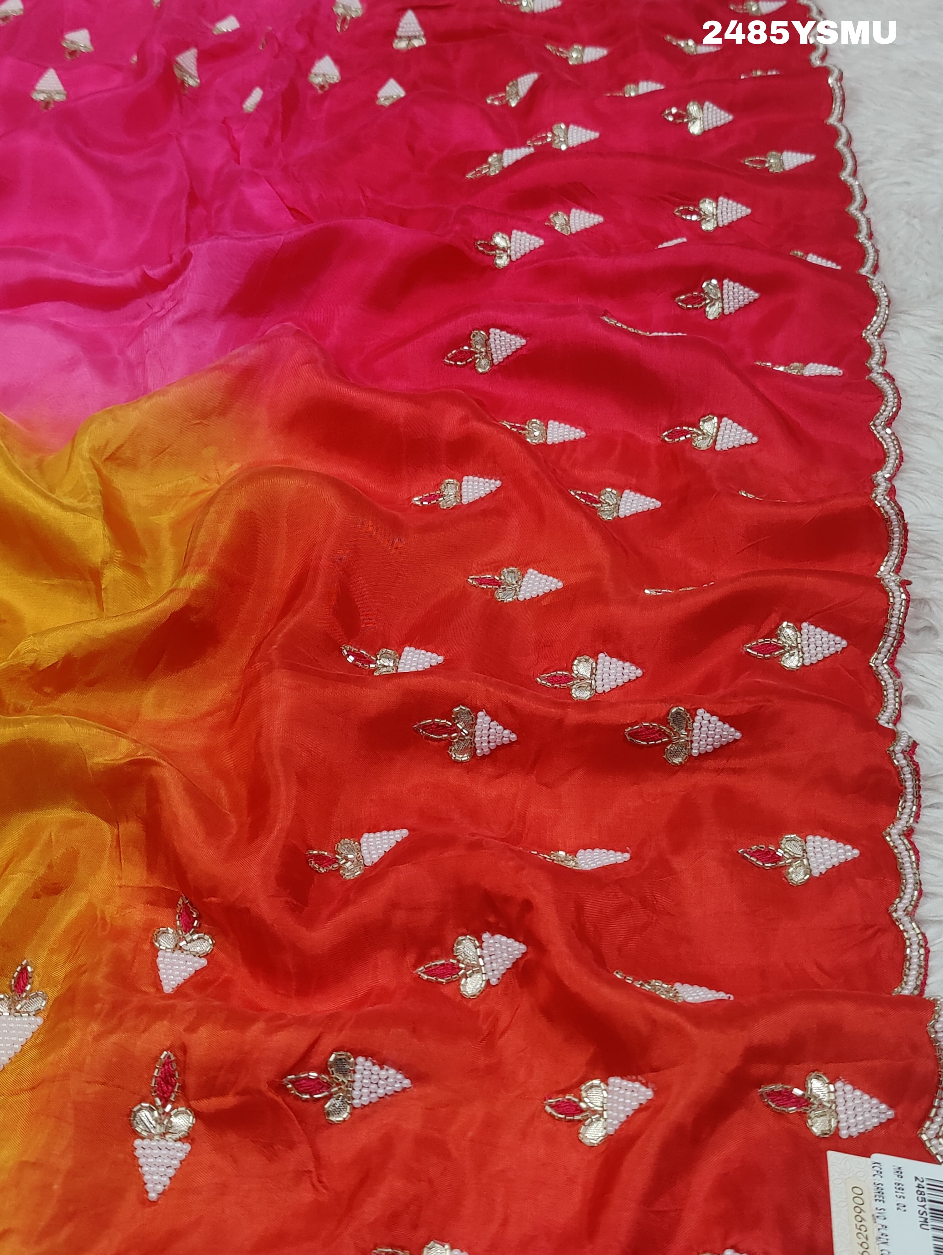 A Chinon silk saree with Gotapatti work, featuringof yellow and pink colors