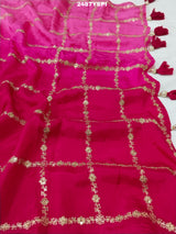 A pink saree with floral pitton work