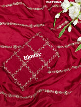 A maroon saree with geometric pattern and pittan work
