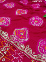 A pink Gaji silk saree with Bandhani style embellishments and Gotapatti work