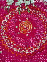 A pink Gaji silk saree with Bandhani style embellishments and Gotapatti work