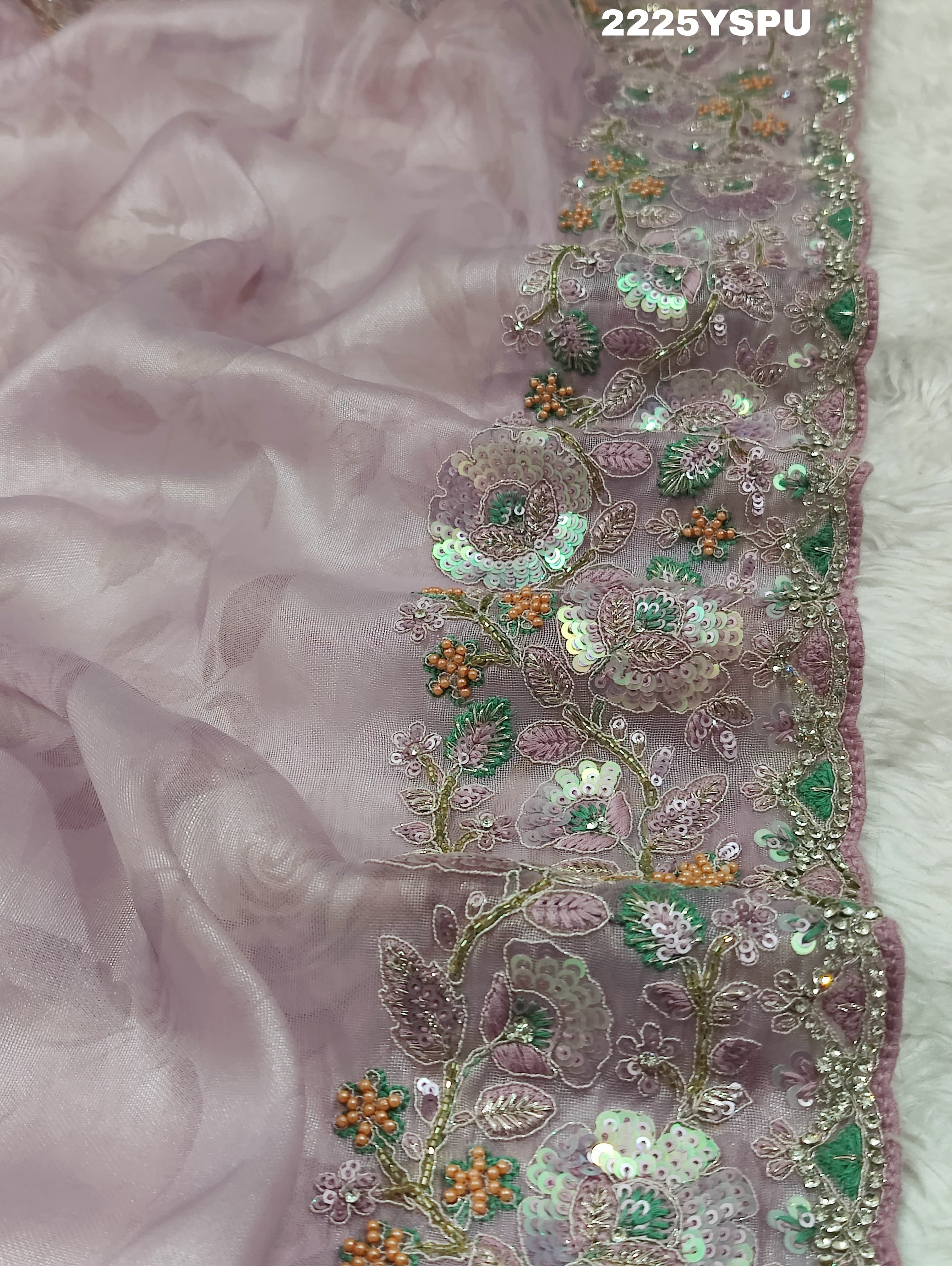 A purple tissue silk Bollywood style saree with sequence embroidery work