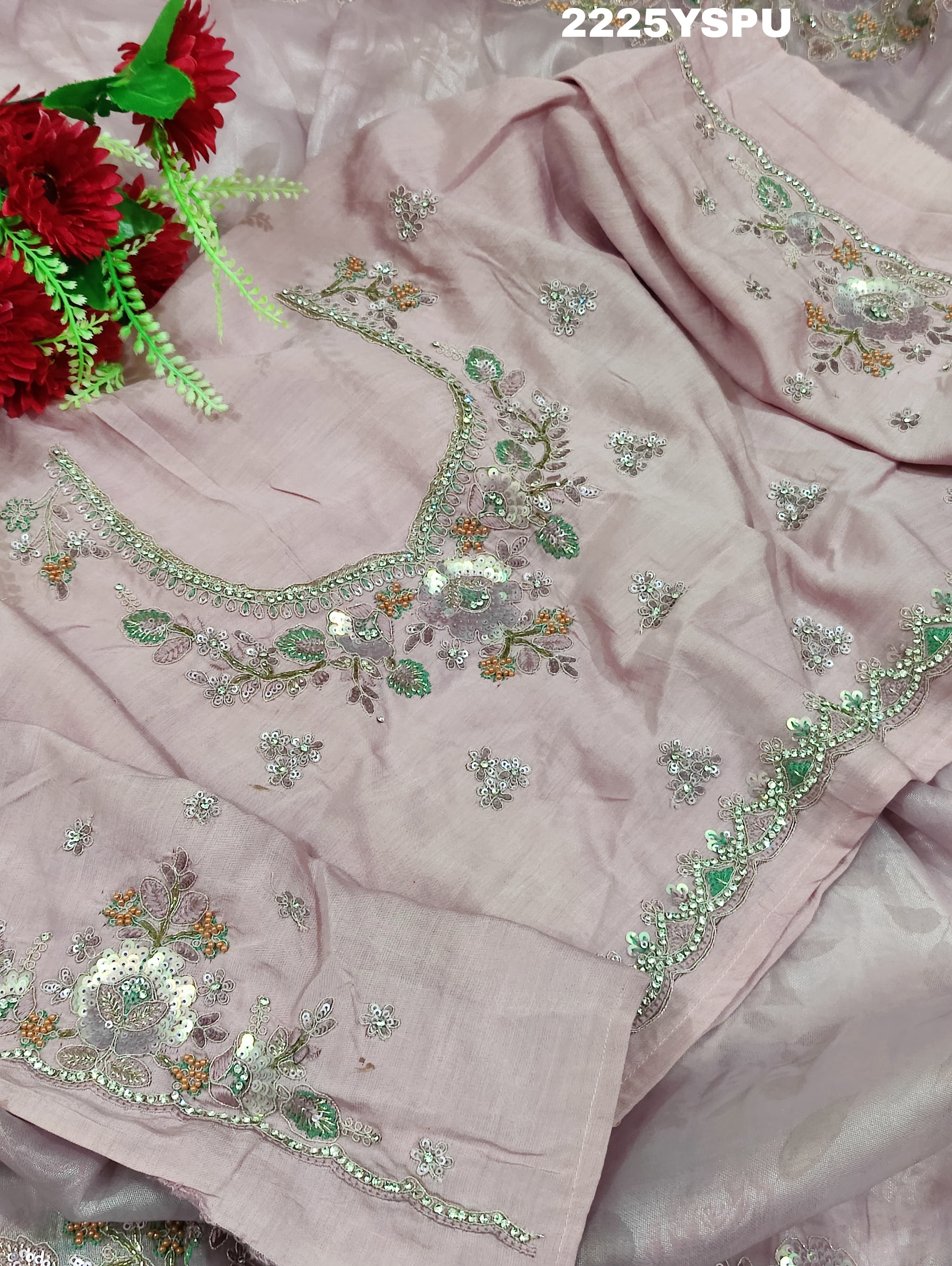 A purple tissue silk Bollywood style saree with sequence embroidery work