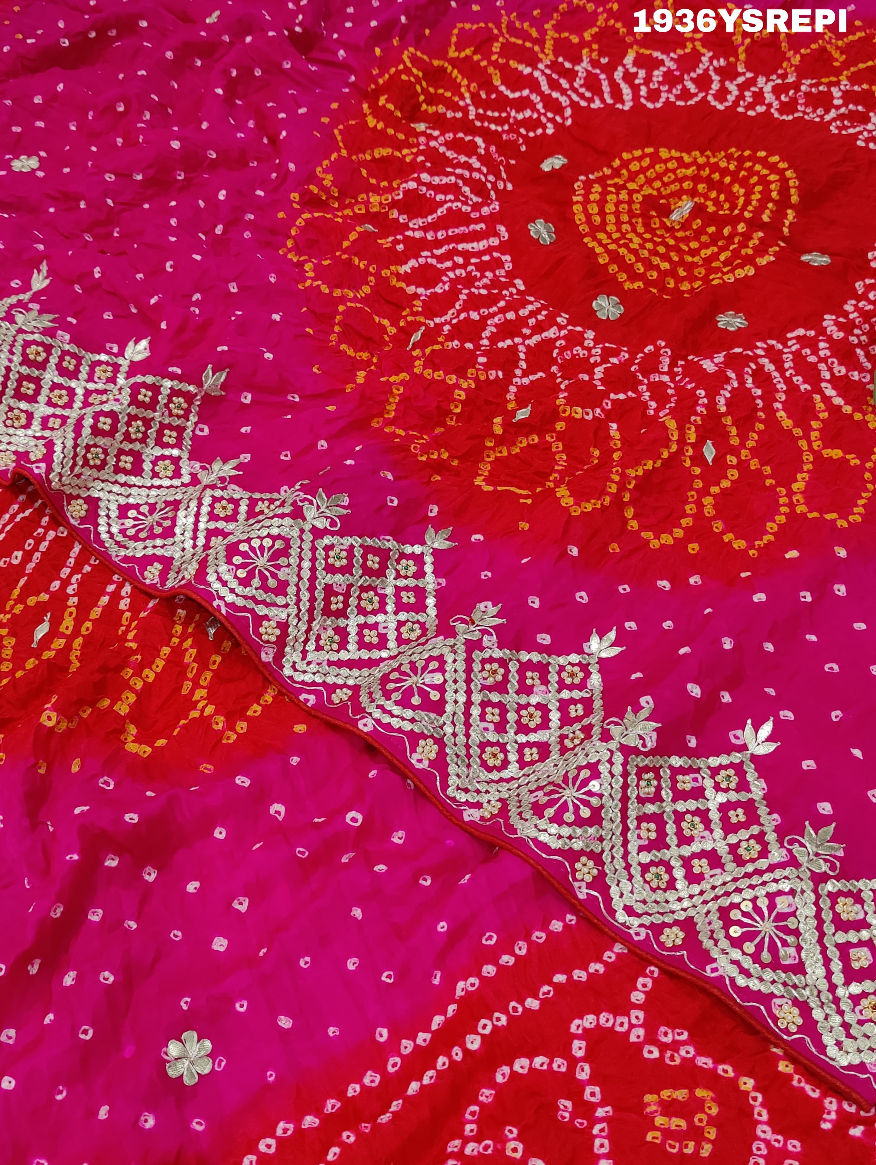 A pink and red Gaji silk saree with Bandhani style Gotapatti work.