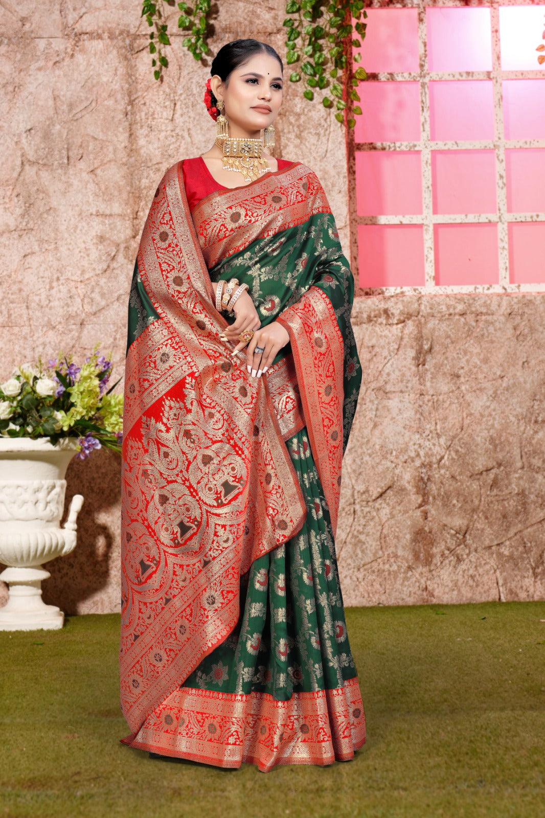 A green and red Banarasi saree with zari weaving for wedding