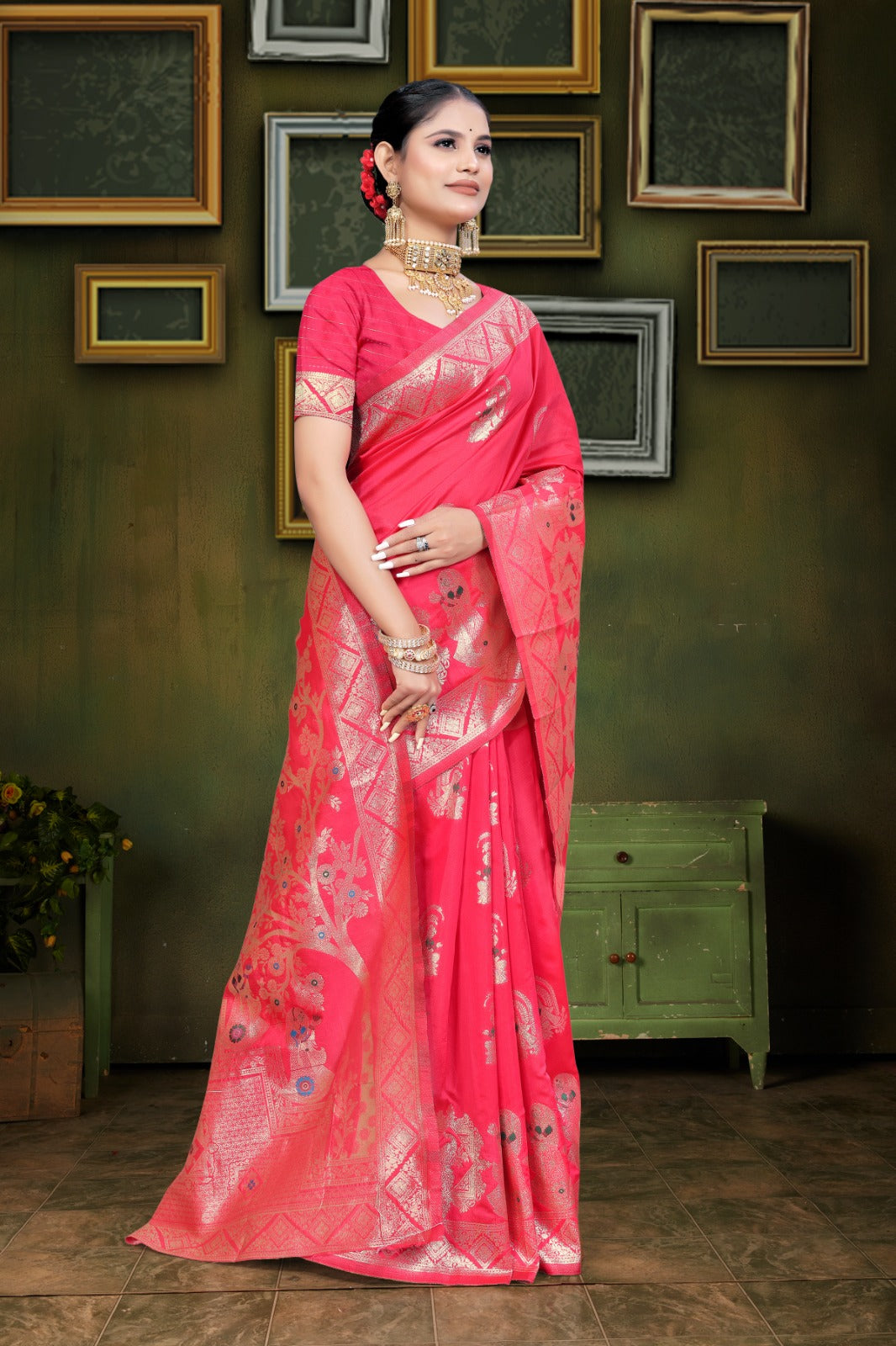 Ared and orange Banarasi saree with zari weaving and floral patterns,