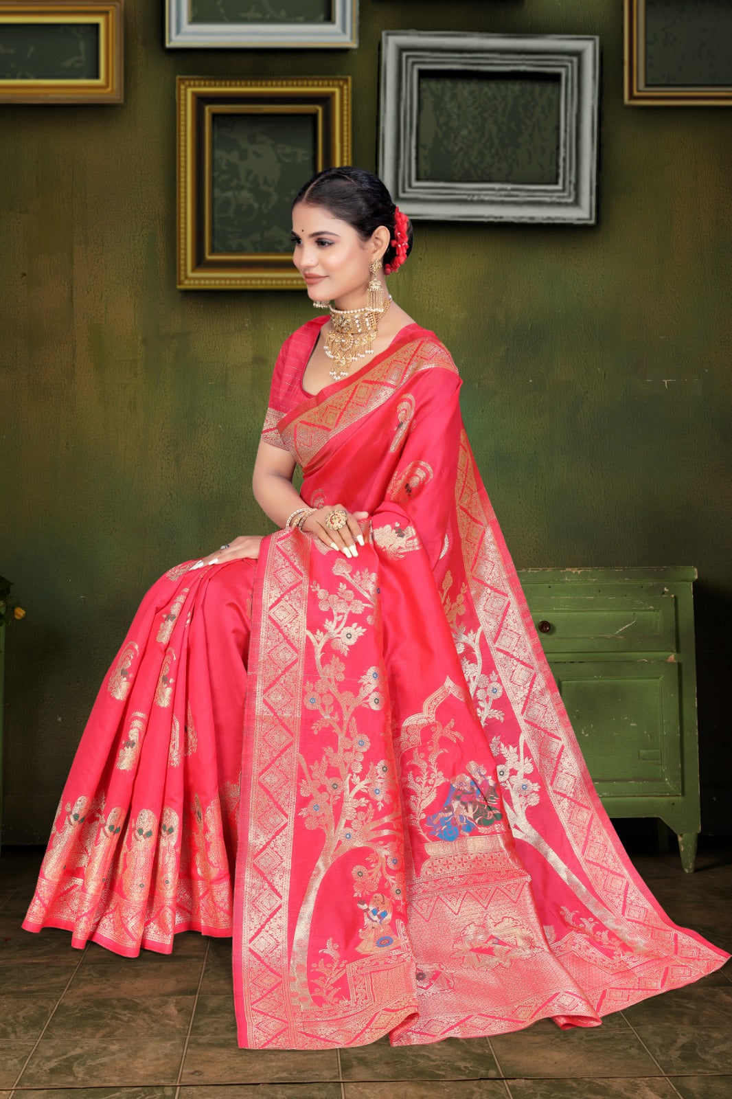 Ared and orange Banarasi saree with zari weaving and floral patterns,