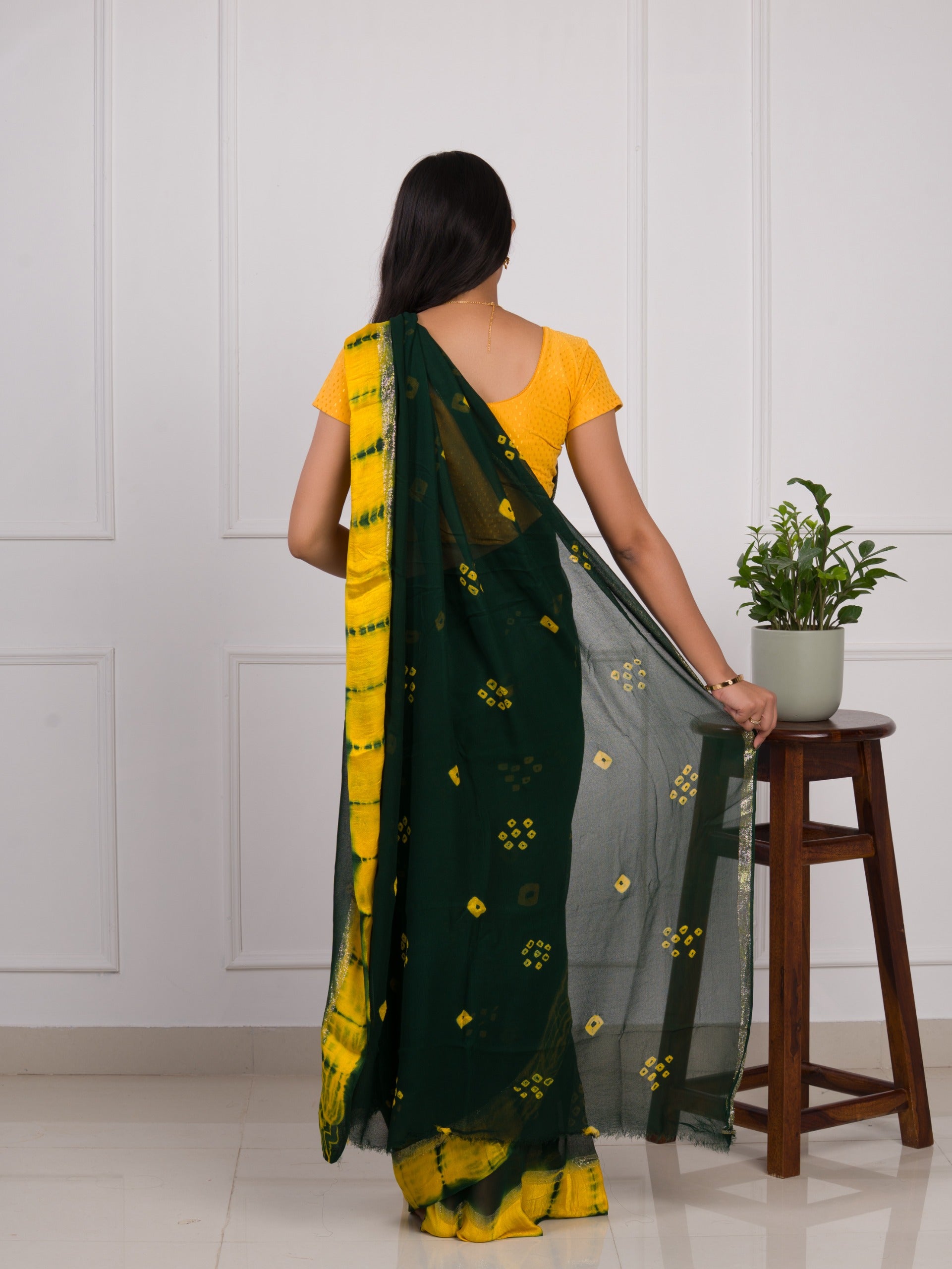 Georgette Gulti Bandhej Satin Patta Border Saree in green colour
