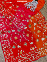 Red and orange saree with white floral patternsBollywood Style with Gotapatti Work