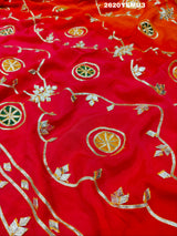 Red and orange saree with white floral patternsBollywood Style with Gotapatti Work