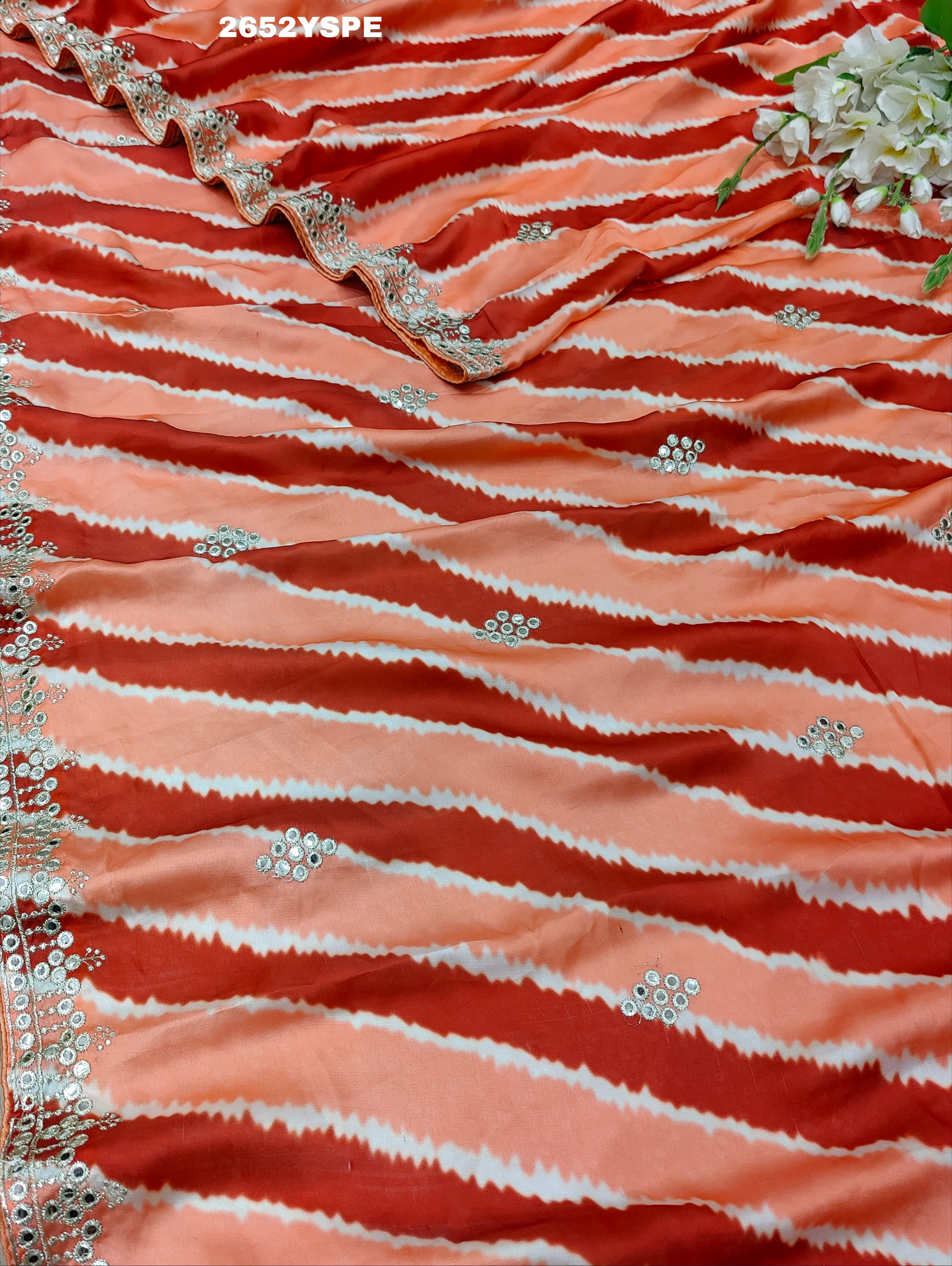By Leheriya SareeWith Traditional Wear