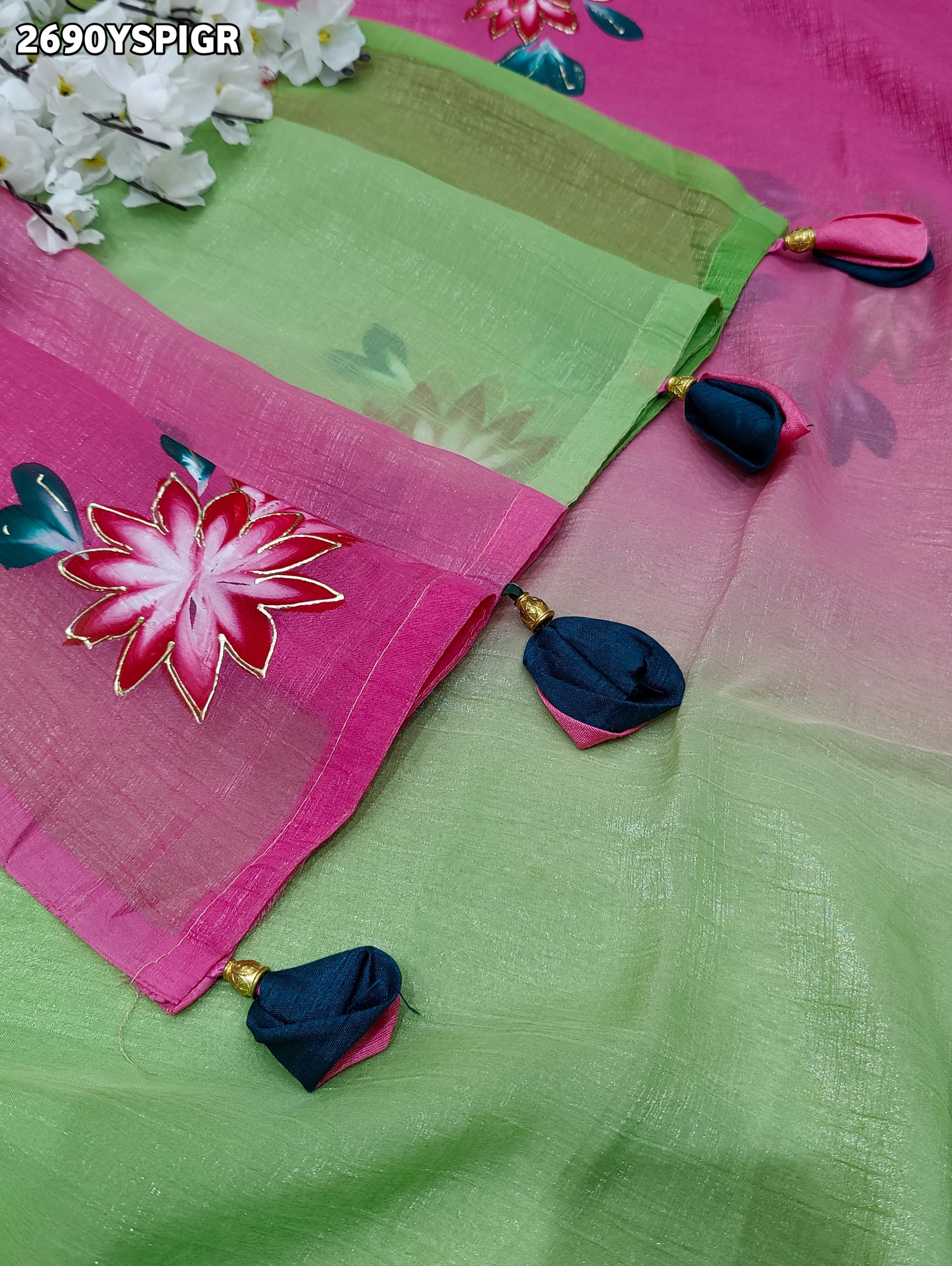 Saree with floral patterns on a pink and green Crush Tissue Printed Style With Casual wear