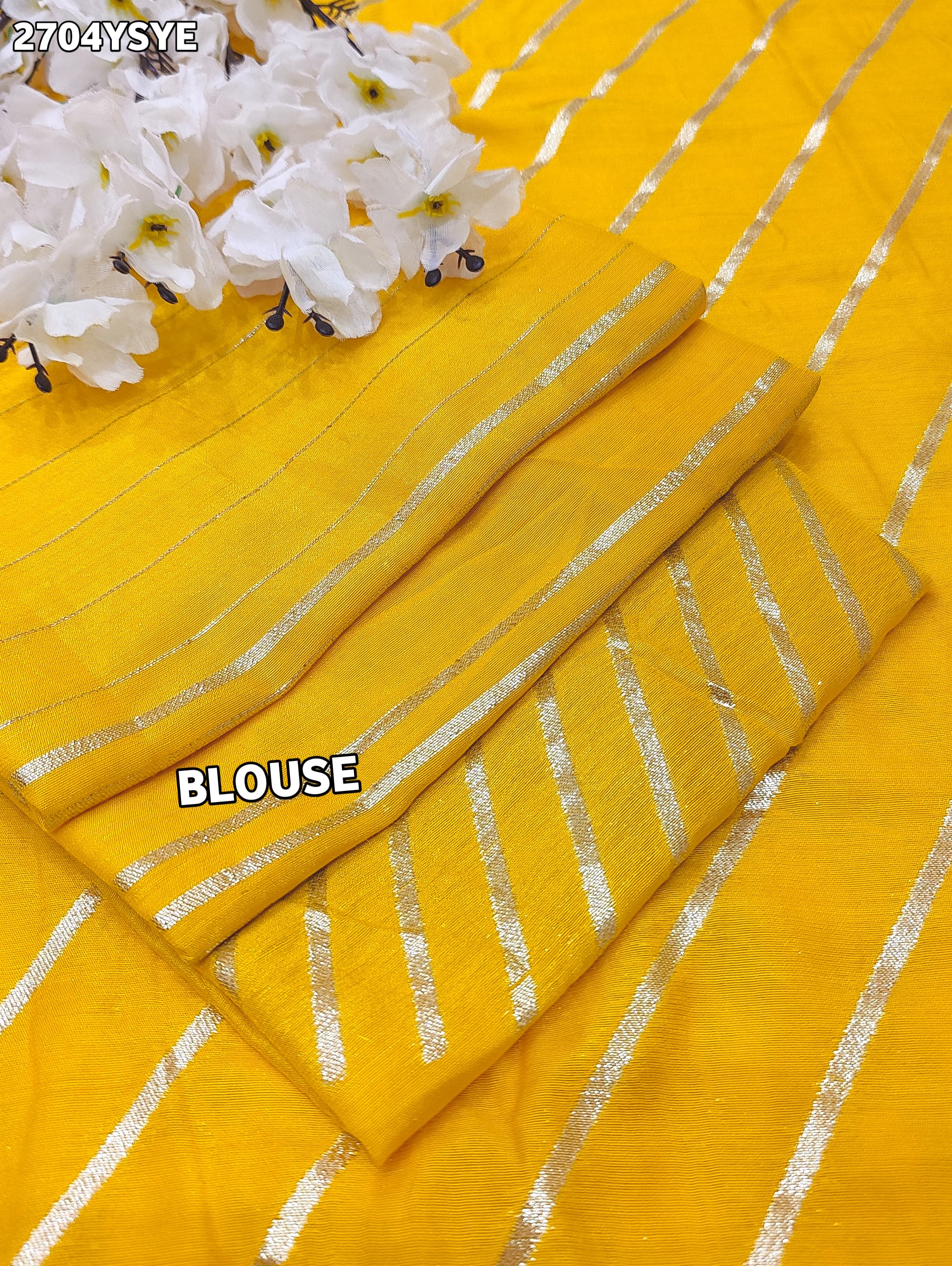 By Yellow saree with silver embroiderySilk Leheriya Style for festive