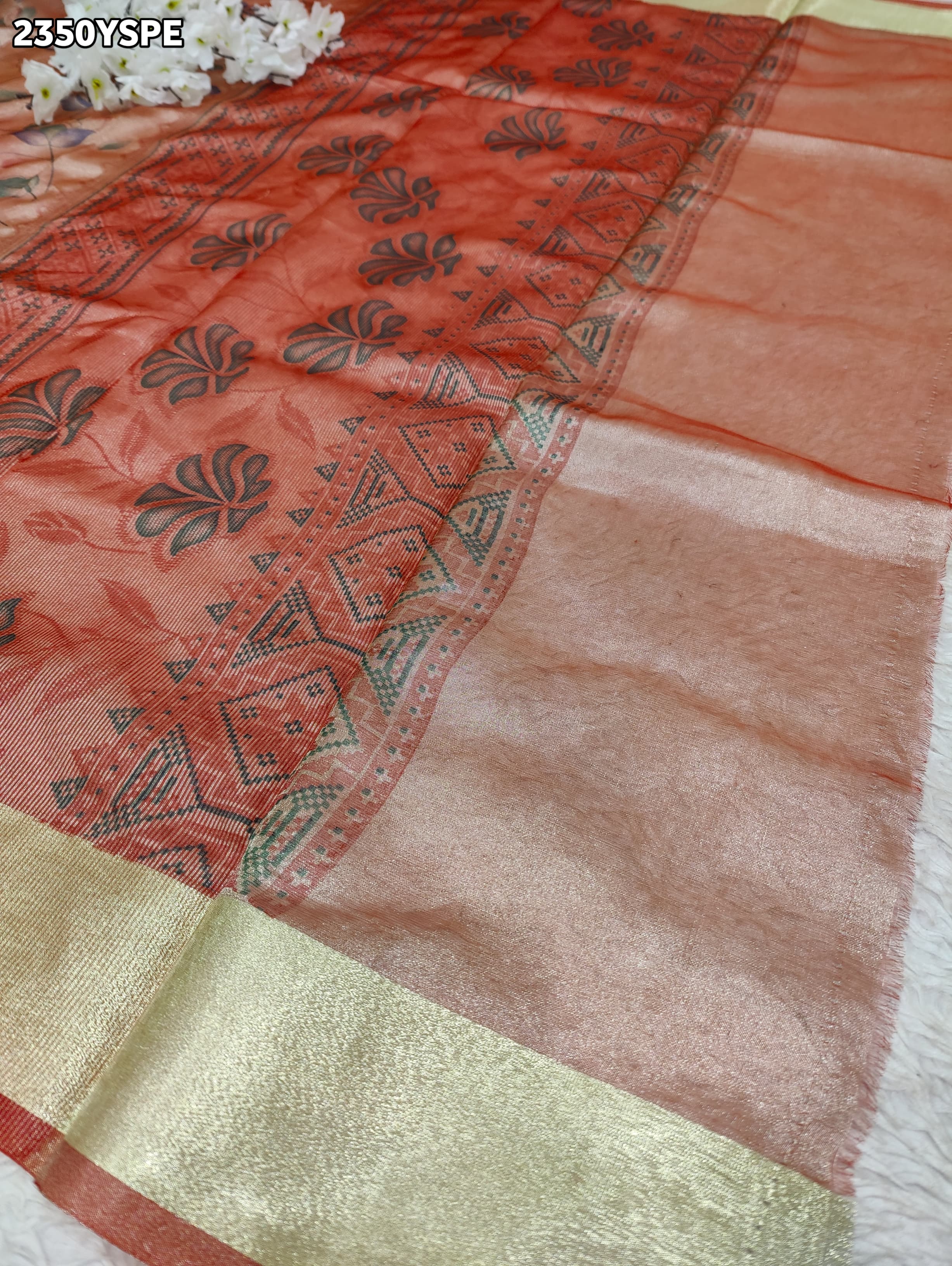 Saree with floral patternsCotton Silk Printed With Zari border Saree