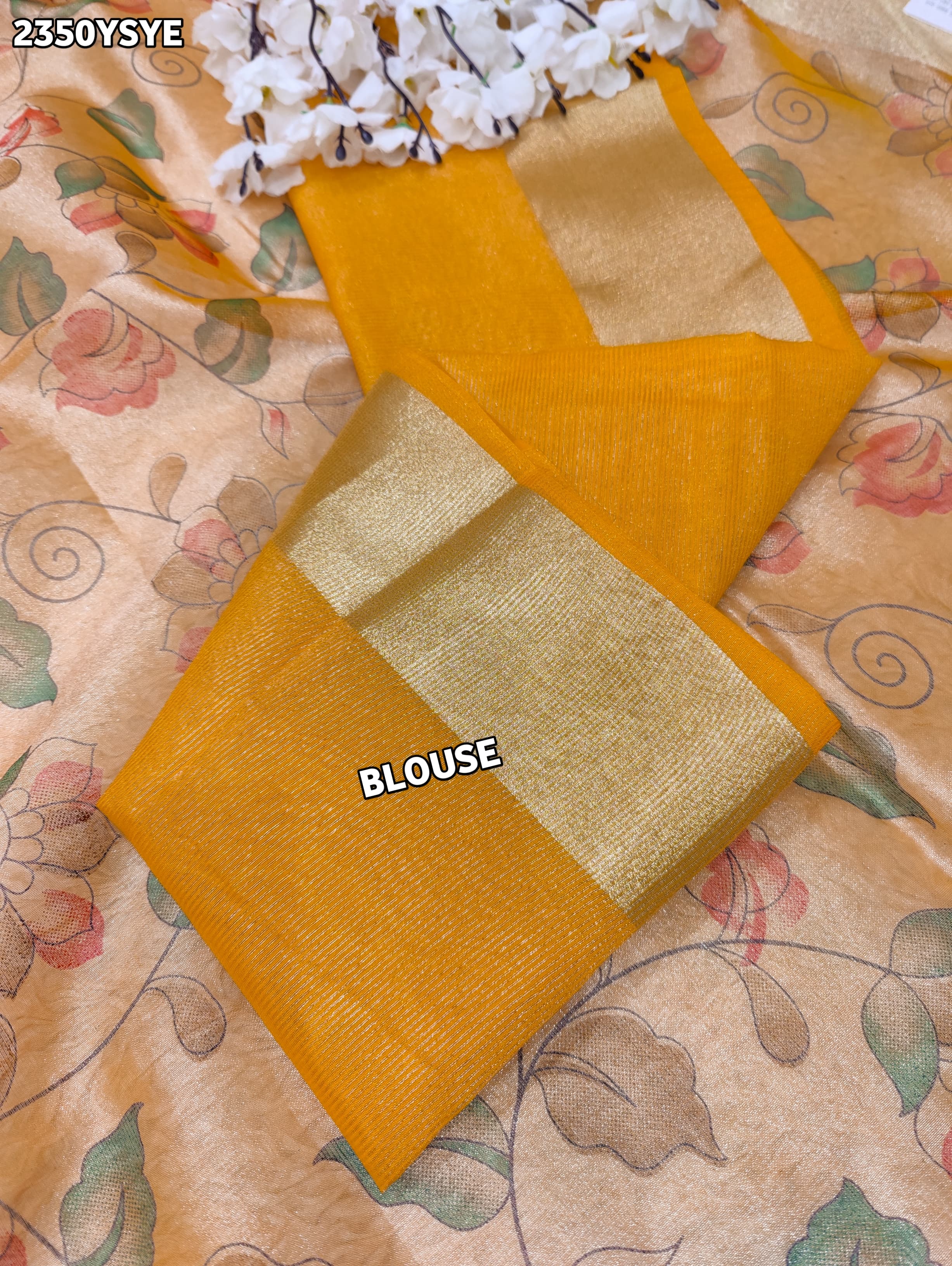 Yellow and beige saree with intricate patternsCotton Silk Printed With Zari border .