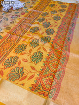 Yellow and beige saree with intricate patternsCotton Silk Printed With Zari border .