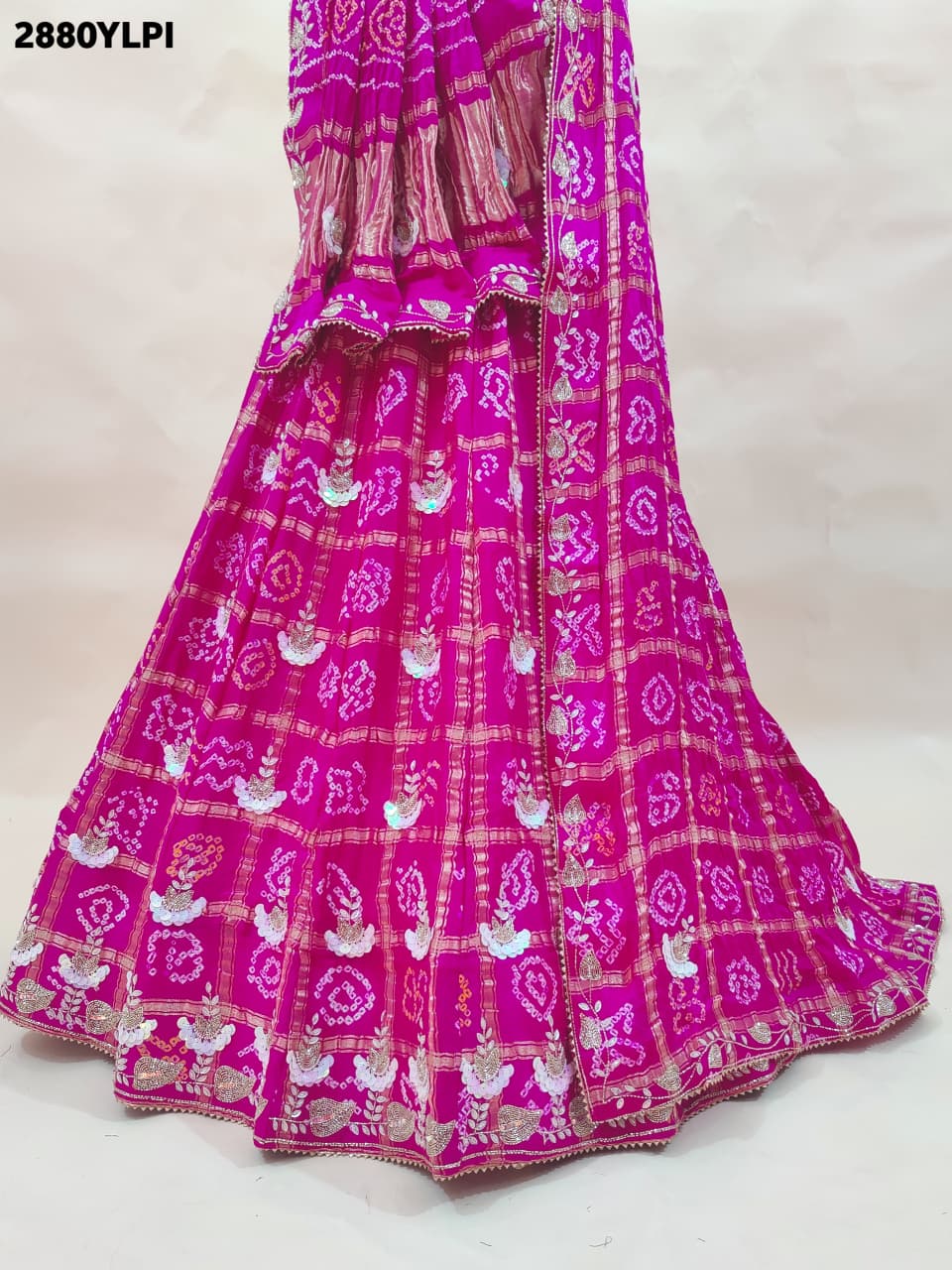 By Bandhani StyleWith Festive Wear