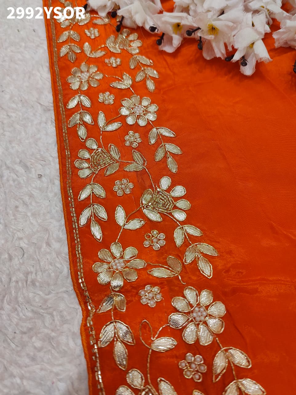 Orange saree with gotapati embroidery for weddings