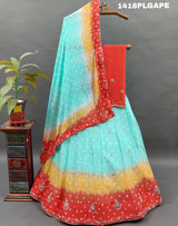 A Lehenga with a multi-color bandhani pattern and cutdana