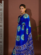 A blue and firozi colored pure gaji silk saree with bandhej gotapatti laddu design
