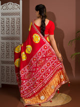 A red saree with bandhej style and gotapatti work in red and yellow colour