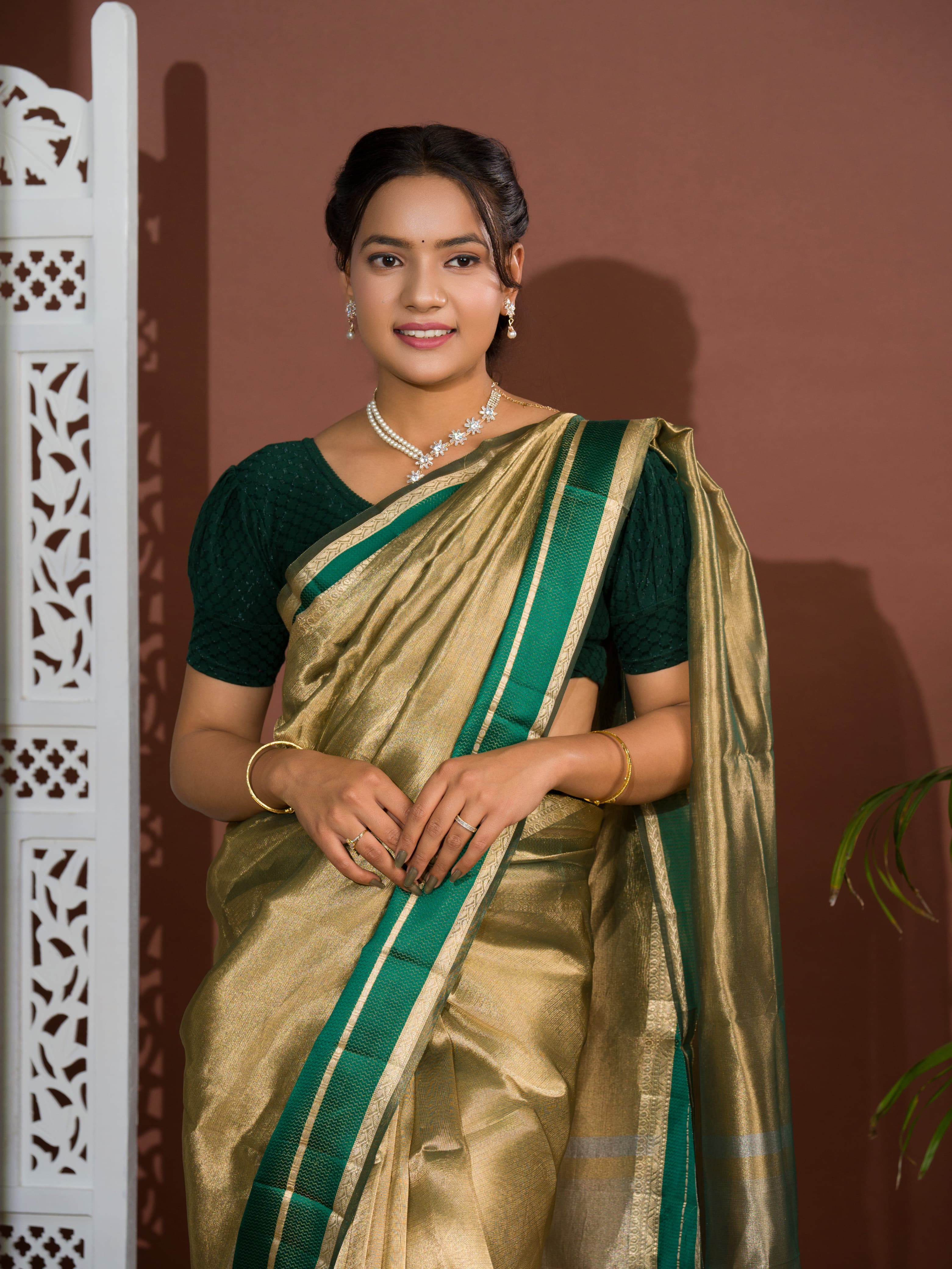 Agreen and gold tissue Banarasi handloom saree