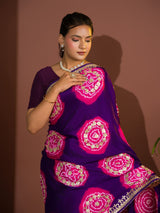A purple and pink bandhej gotapatti saree