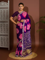 A purple and pink bandhej gotapatti saree