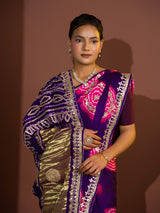 A purple and pink bandhej gotapatti saree