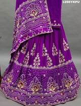 A purple Gajji silk lehenga with white bead work